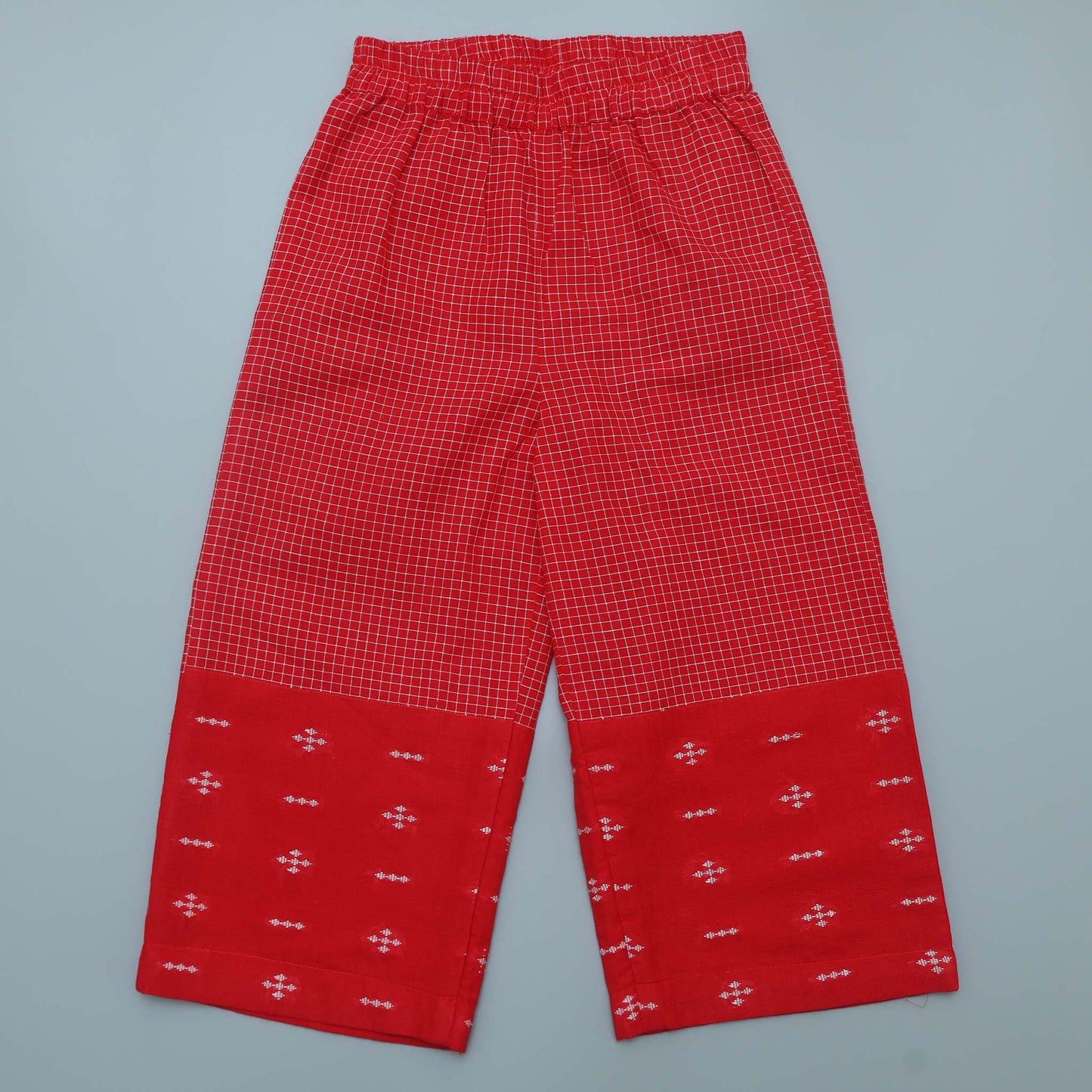 Red checkered pants with a patterned bottom.