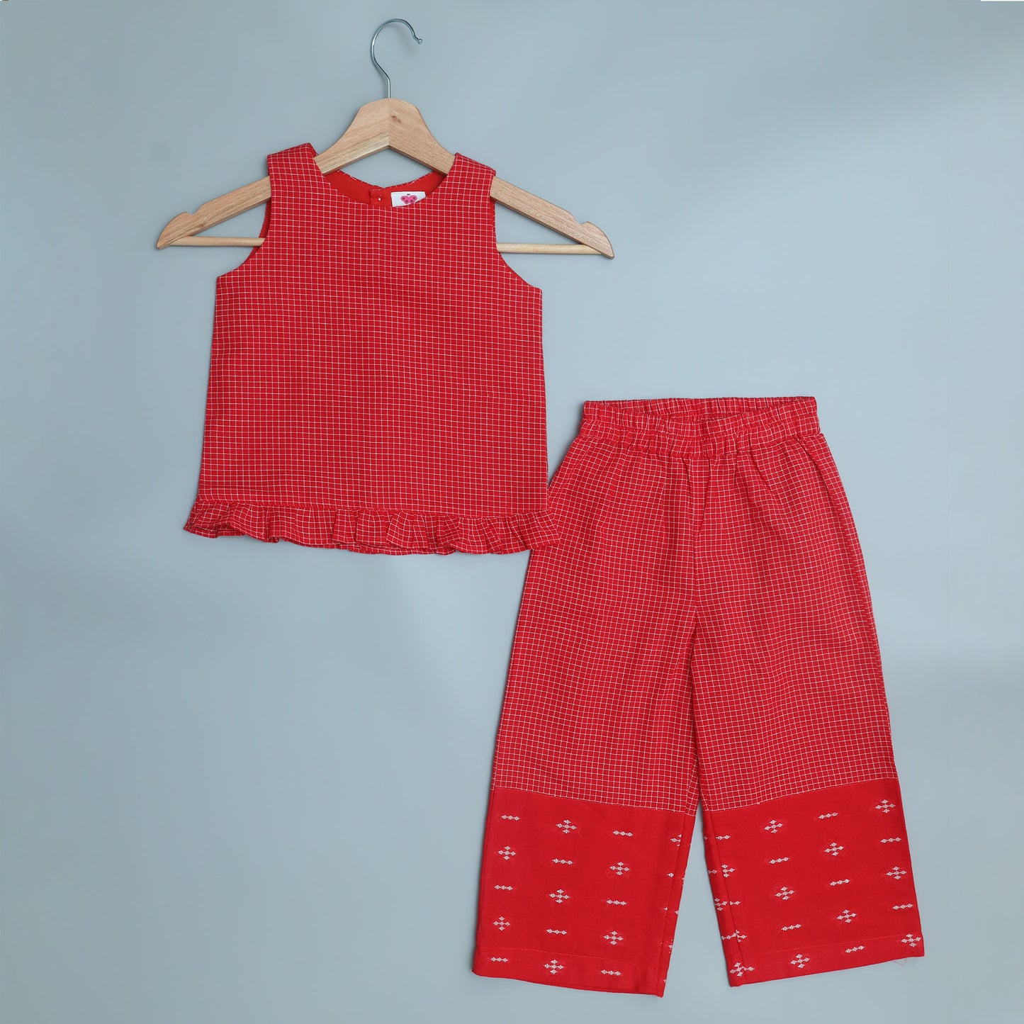 Snuk Kids girls' red checkered sleeveless top with frill hem and matching wide-leg trousers.