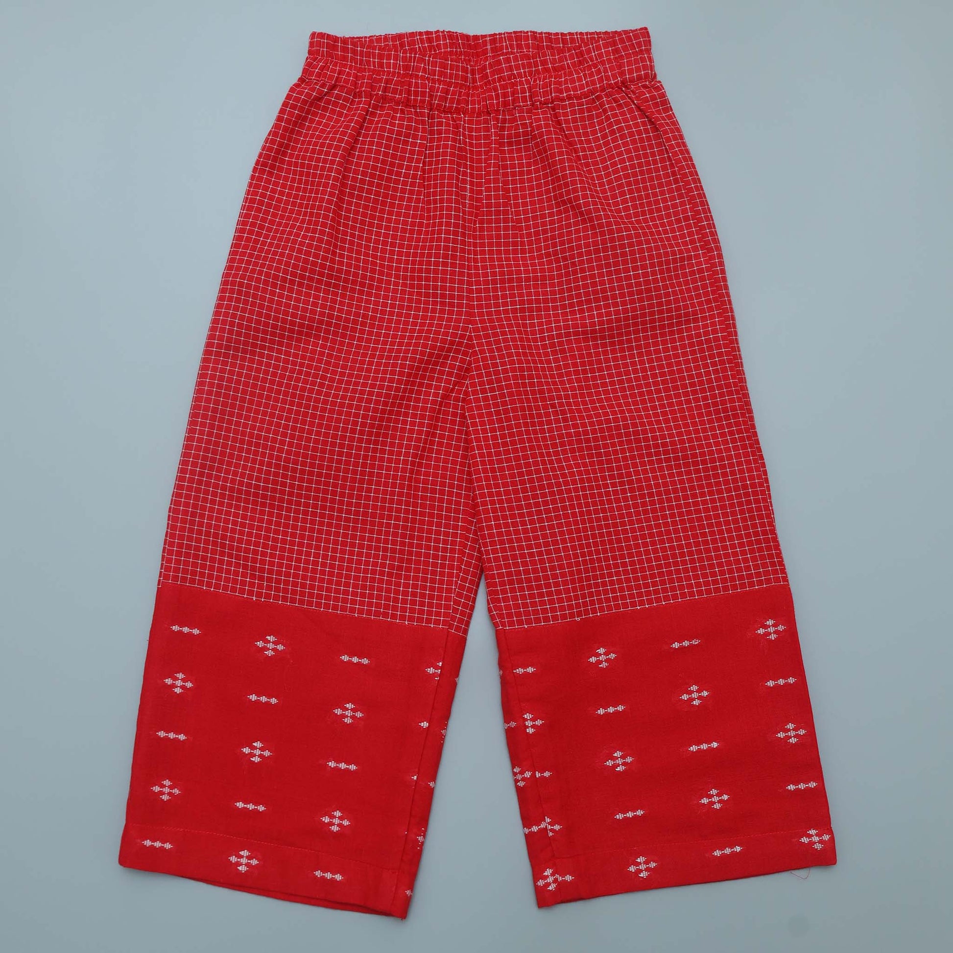 Red checkered pants with a patterned bottom.