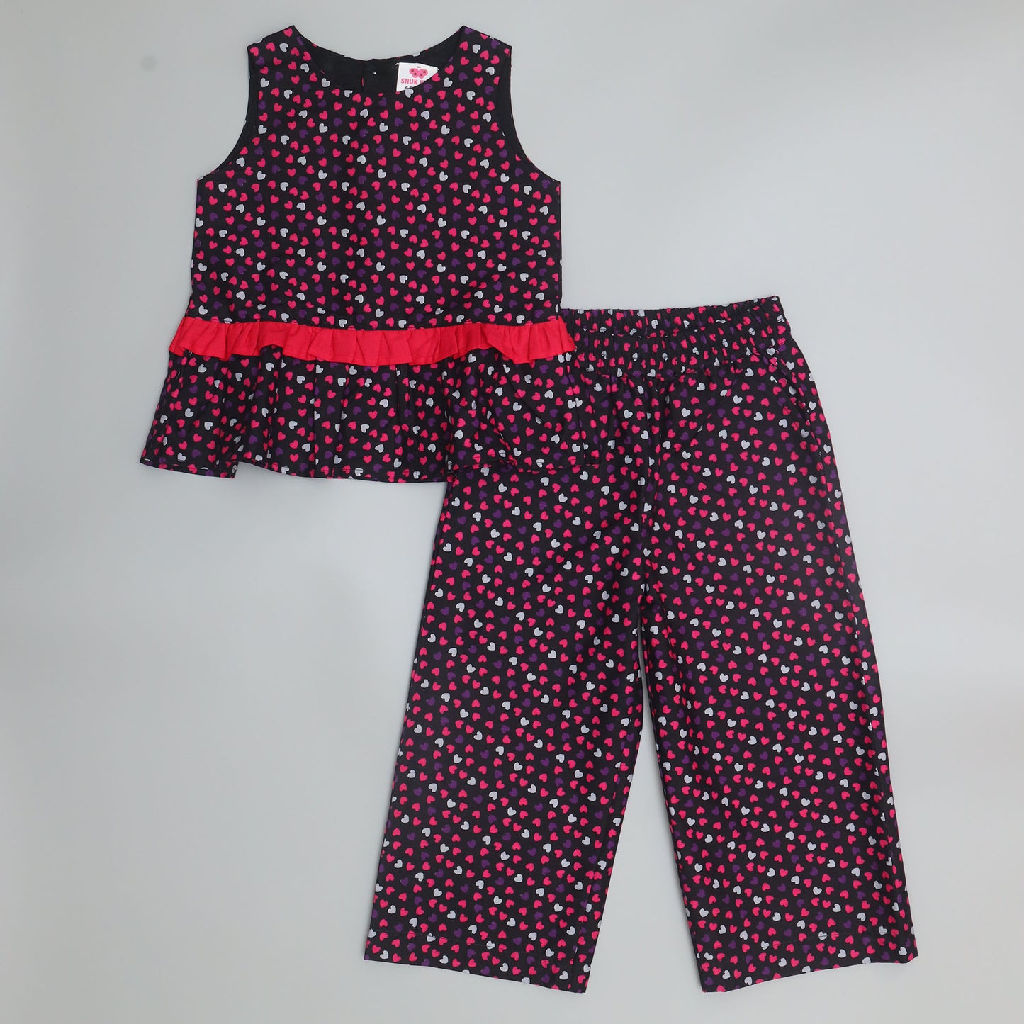 Children's outfit with top and pants. Black top and trouser set.